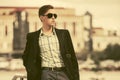 Young handsome business man in black blazer and sunglasses Royalty Free Stock Photo