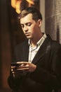 Young handsome business man using cell phone on city street Royalty Free Stock Photo