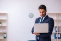 Young handsome businessman employee working in the office Royalty Free Stock Photo