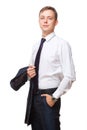 Young handsome businessman is holding a jacket in his one hand and the other hand in his pocket. portrait isolated on Royalty Free Stock Photo