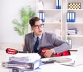 Young handsome businessman playing guitar in the office Royalty Free Stock Photo