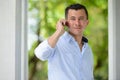 Young handsome businessman talking on the phone at the park Royalty Free Stock Photo