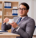 Young handsome businessman working on office Royalty Free Stock Photo