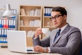 The young handsome businessman working on office Royalty Free Stock Photo