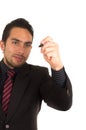 Young handsome businessman writing on whiteboard