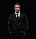 Businessmanman in black suit and glasses Royalty Free Stock Photo