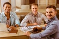 Young handsome businessmen coworking