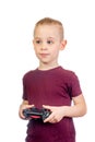 Young handsome caucasian boy plays computer games with joystick