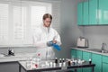Young handsome chemist working in a lab Royalty Free Stock Photo