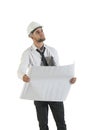 Young handsome construction technician reading drawing plans on white Royalty Free Stock Photo