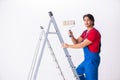 The young handsome contractor working indoors Royalty Free Stock Photo