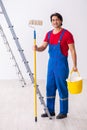 Young handsome contractor working indoors Royalty Free Stock Photo