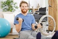 Young handsome disabled paraplegic man in wheelchair Royalty Free Stock Photo