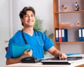 Young handsome doctor radiologyst working in clinic Royalty Free Stock Photo