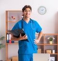 Young handsome doctor radiologyst working in clinic Royalty Free Stock Photo