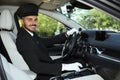 Young handsome driver in luxury car Royalty Free Stock Photo