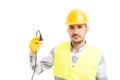 Young handsome electrician holding unplugged cable Royalty Free Stock Photo