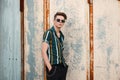 Young handsome guy with fashionable sunglasses Royalty Free Stock Photo