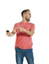 Young handsome guy laughing about something on his mobile phone Royalty Free Stock Photo