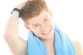 Young handsome guy wipes the hair with a towel after shower Royalty Free Stock Photo