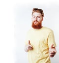 Young handsome hipster ginger bearded guy looking brutal isolate Royalty Free Stock Photo
