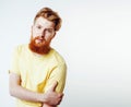 Young handsome hipster ginger bearded guy looking brutal isolate Royalty Free Stock Photo