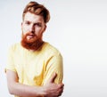 Young handsome hipster ginger bearded guy looking brutal isolate Royalty Free Stock Photo