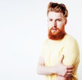 Young handsome hipster ginger bearded guy looking brutal isolate Royalty Free Stock Photo