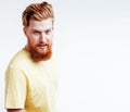 Young handsome hipster ginger bearded guy looking brutal isolate Royalty Free Stock Photo