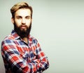 Young handsome hipster ginger bearded guy looking brutal isolate Royalty Free Stock Photo