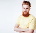 Young handsome hipster ginger bearded guy looking brutal isolated on white background, lifestyle people concept Royalty Free Stock Photo