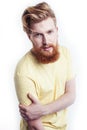 Young handsome hipster ginger bearded guy looking brutal isolated on white background, lifestyle people concept Royalty Free Stock Photo