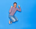 Young handsome hispanic businessman wearing glasses smiling happy Royalty Free Stock Photo