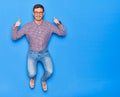 Young handsome hispanic businessman wearing glasses smiling happy Royalty Free Stock Photo