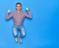 Young handsome hispanic businessman wearing glasses smiling happy Royalty Free Stock Photo