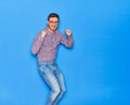 Young handsome hispanic businessman wearing glasses smiling happy Royalty Free Stock Photo