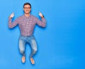 Young handsome hispanic businessman wearing glasses smiling happy Royalty Free Stock Photo