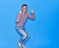 Young handsome hispanic businessman wearing glasses smiling happy Royalty Free Stock Photo