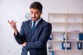 Young handsome businessman employee working in the office Royalty Free Stock Photo