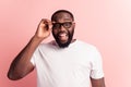 Young handsome man with beard excited face on pink background