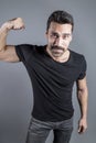 Young handsome man with beard and mustache studio portrait Royalty Free Stock Photo