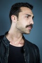 Young handsome man with beard and mustache studio portrait Royalty Free Stock Photo
