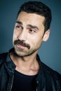 Young handsome man with beard and mustache studio portrait Royalty Free Stock Photo