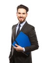 Young handsome man in black suit and folder smiling isolated Royalty Free Stock Photo