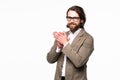 Young handsome man in black suit and glasses smiling isolated on white background Royalty Free Stock Photo