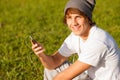 Young handsome man consulting phone outdoors Royalty Free Stock Photo