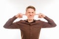 Young handsome man covering his ears ignoring noise Royalty Free Stock Photo