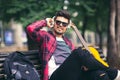 Young handsome man with headphones listening to music in a park Royalty Free Stock Photo