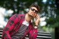 Young handsome man with headphones listening to music in a park Royalty Free Stock Photo