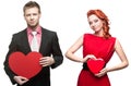 Young handsome man holding red heart and cheerful woman on white Royalty Free Stock Photo